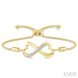 1/20 Ctw Conjoined Hearts Round Cut Diamond Lariat Bracelet in Yellow Gold Vermeil