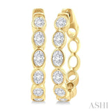 1 1/10 Ctw Bezel Set Oval Cut Diamond Fashion Hoop Earring in 14K Yellow Gold
